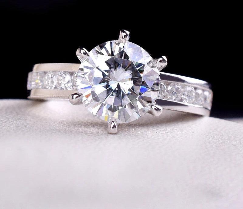 2CT Round Cut Moissanite Ring with Channel Set Round Stones - The Real Jewelry CompanyThe Real Jewelry CompanyRings